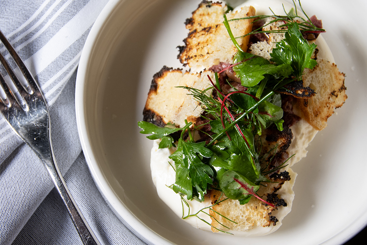 Burrata, muffuletta spread, toasted focaccia, herb salad