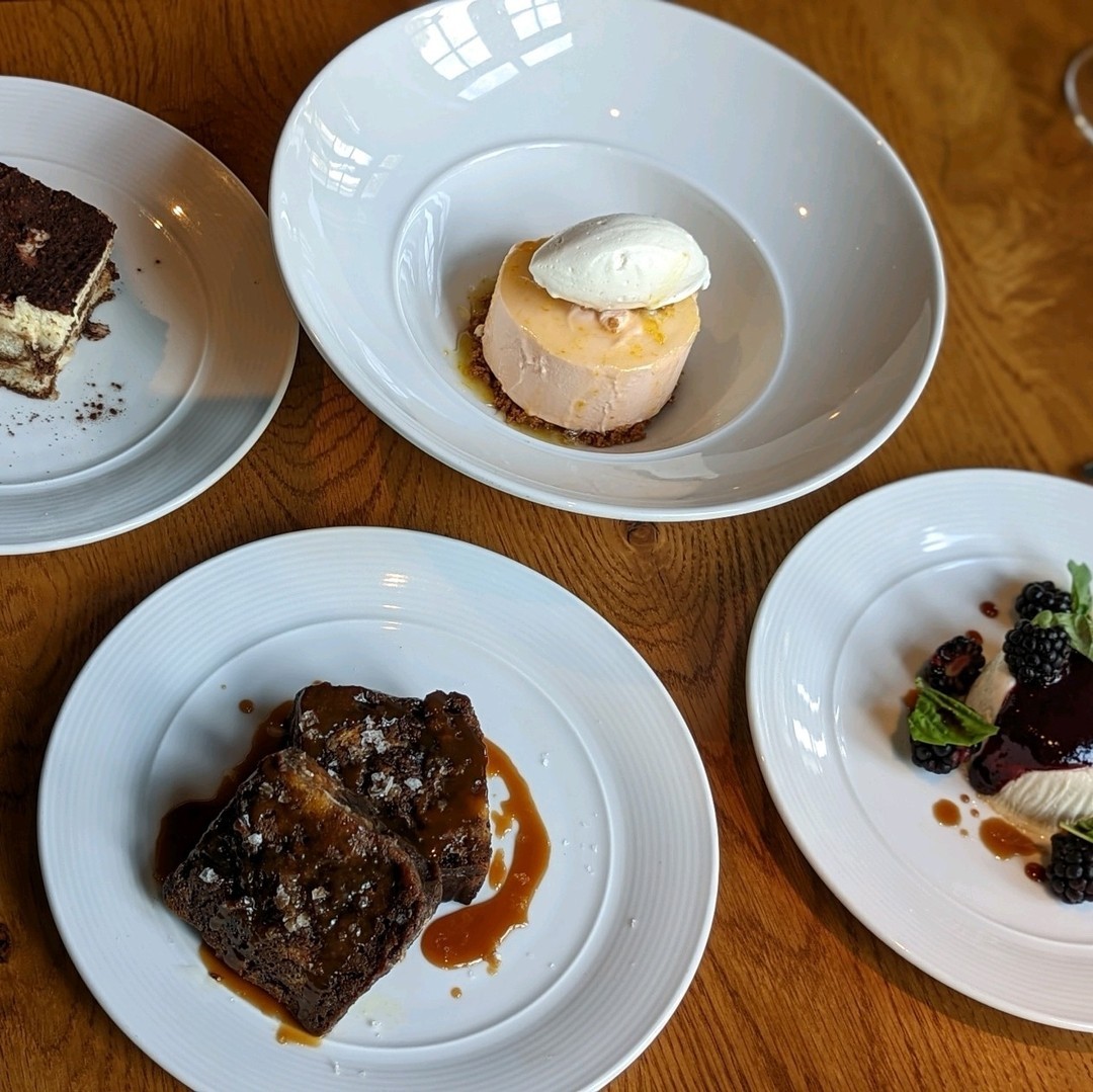 The dessert menu is ready for summer! Clockwise from top left we've got a tiramisu made with marscapone, an orange dreamsicle semifreddo with a brown butter crunch, a panna cotta with blackberry and basil, and a chocolate bread pudding with salted caramel. ⁠
.⁠
Reservations at EstablishmentCHS.com⁠
.⁠
.⁠
.⁠
#southofbroad #desserts #tasteofsummer #sweettooth #chseats