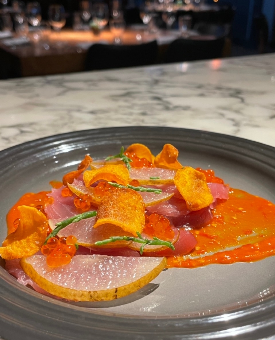 New this weekend: Tiradito, local tuna, smoked trout roe, sea beans, sweet potato chips, pickled pears. ⁠
⁠
What's a Tiradito? Glad you asked! It's a Peruvian dish of raw fish, similar to sashimi and carpaccio, in a spicy sauce. It's amazing. ⁠
⁠
#eatlocal #trysomethingnew #southofbroad #sustainableseafood #rediscoverseafood #charleston #explorecharleston #foodie