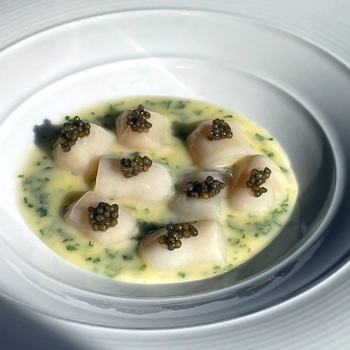 New to the menu for a limited time: Nantucket Bay scallop crudo with white shoyu, buerre blanc, and golden Osetra Caviar. ⁠
<br/>
<br/>
<br/>
#chseats #osetra #caviar #scallops #southofbroad #explorecharleston