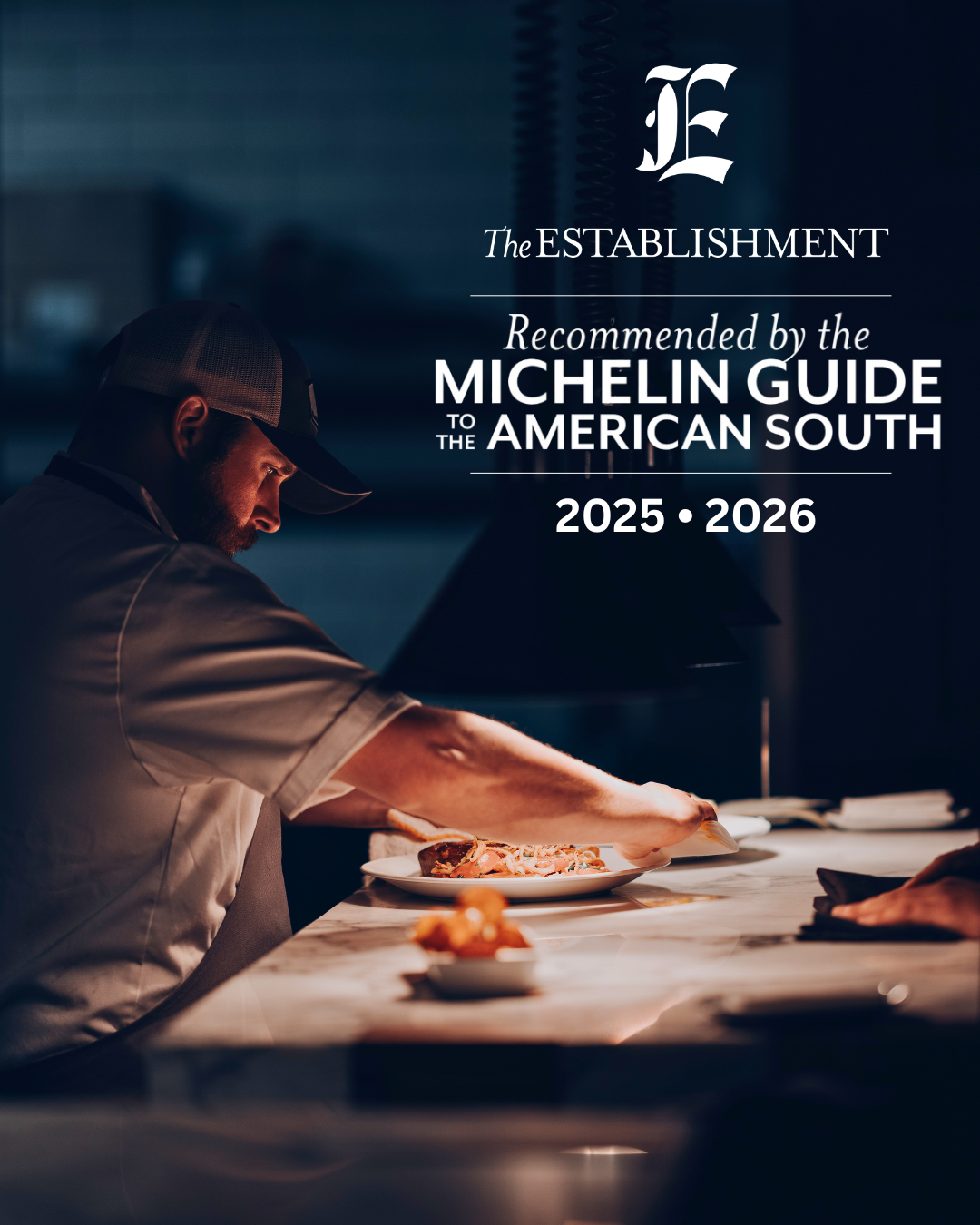 Executive Chef Elliott Howells preparing a whole fish, with text above image saying Recommended by the Michelin Guide to the American South